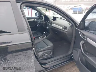 2017 Audi Q3 Premium with VIN WA1BCCFSXHR012345, listed as a IAAI auction lot 41589844 with 125,044 mi miles. Bid and sale history available at carsss.com. Image 5.