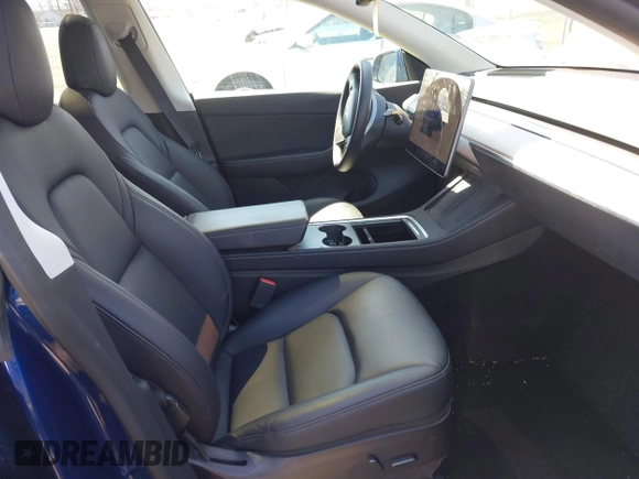 2022 Tesla Model Y Long Range with VIN 7SAYGDEE3NF449873, listed as a IAAI auction lot 41900271 with 38,571 mi miles and . Bid and sale history available at carsss.com. Image 5.