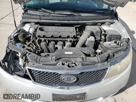 2010 Kia Forte EX z VIN KNAFU4A21A5066595, wystawiony jako Copart lot #53303195 z przebiegiem 190 992 mil mil oraz Nie do naprawy. Historia ofert i sprzedaży dostępna na DreamBid. Obrazek 11.