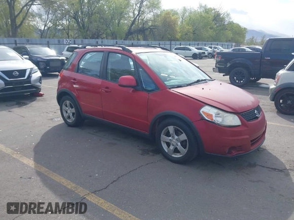 2012 Suzuki SX4 Crossover with VIN JS2YB5A3XC6302115, listed as a IAAI auction lot 42058201 with 113,700 mi miles. Bid and sale history available at carsss.com. Image 1.
