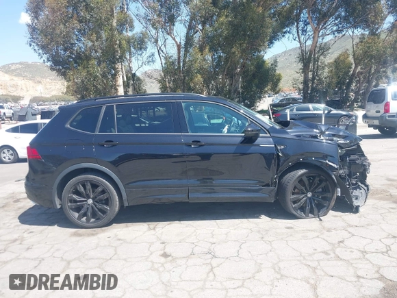 2021 Volkswagen Tiguan SE with VIN 3VV3B7AX0MM015825, listed as a IAAI auction lot 41955268 with 57,909 mi miles and . Bid and sale history available at DreamBid. Image 13.