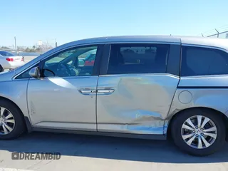 2016 Honda Odyssey SE with VIN 5FNRL5H32GB153002, listed as a IAAI auction lot 42084022 with 63,764 mi miles and . Bid and sale history available at DreamBid. Image 14.