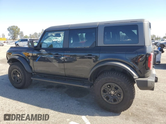 2024 Ford Bronco Wildtrak z VIN 1FMEE2BP1RLA54539, wystawiony jako Copart lot #46310905 z przebiegiem 12 545 mil mil oraz Szkody całkowita. Historia ofert i sprzedaży dostępna na DreamBid. Obrazek 2.