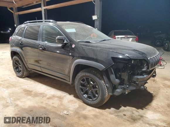 2022 Jeep Cherokee Trailhawk with VIN 1C4PJMBX5ND526816, listed as a Copart auction lot 87394464 with 25,070 mi miles and Salvage Title. Bid and sale history available at carsss.com. Image 4.