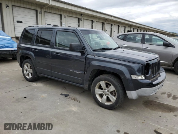 2014 Jeep Patriot Limited with VIN 1C4NJPCB9ED900811, listed as a Copart auction lot 58061115 with 230,415 mi miles and Salvage title. Bid and sale history available at DreamBid. Image 4.