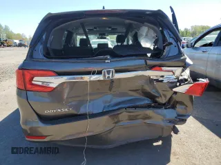 2018 Honda Odyssey EX-L z VIN 5FNRL6H71JB016424, wystawiony jako Copart lot #53859505 z przebiegiem 91 669 mil mil oraz Szkoda całkowita • Salvage title. Historia ofert i sprzedaży dostępna na DreamBid. Obrazek 6.
