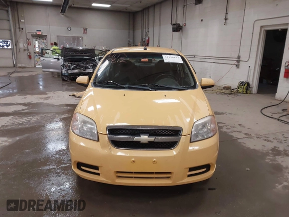 2010 Chevrolet Aveo 1LT z VIN KL1TD5DE2AB101431, wystawiony jako IAAI lot #41138812 z przebiegiem 131 346 mil mil oraz . Historia ofert i sprzedaży dostępna na DreamBid. Obrazek 13.