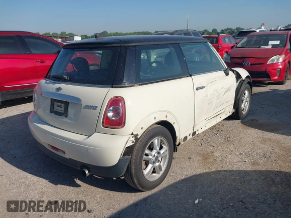 2013 MINI Hardtop with VIN WMWSU3C56DT681952, listed as a IAAI auction lot 42325521 with 124,405 mi miles and . Bid and sale history available at DreamBid. Image 4.