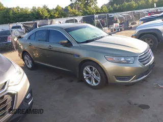 2013 Ford Taurus SEL with VIN 1FAHP2E91DG235771, listed as a IAAI auction lot 40210537 with 179,780 mi miles and . Bid and sale history available at carsss.com. Image 14.