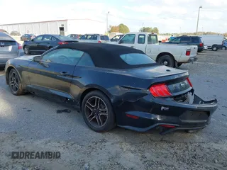 2021 Ford Mustang EcoBoost with VIN 1FATP8UH6M5103235, listed as a IAAI auction lot 40711543 with 52,470 mi miles. Bid and sale history available at carsss.com. Image 3.