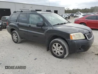 2010 Mitsubishi Endeavor LS with VIN 4A4JM2AS0AE011338, listed as a Copart auction lot 83211414 with 104,582 mi miles and Salvage Title. Bid and sale history available at carsss.com. Image 4.