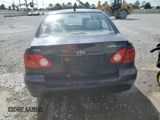 2004 Toyota Corolla CE with VIN 1NXBR38E74Z335430, listed as a Copart auction lot 51757685 with 299,999 mi miles and Salvage Title. Bid and sale history available at DreamBid. Image 6.