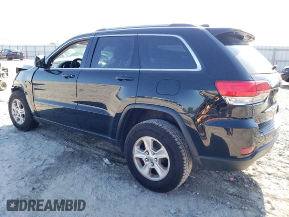 2017 Jeep Grand Cherokee Laredo with VIN 1C4RJEAG4HC952605, listed as a Copart auction lot 56693145 with 115,035 mi miles and Salvage title. Bid and sale history available at DreamBid. Image 2.