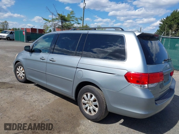 2010 Honda Odyssey EX-L with VIN 5FNRL3H74AB046578, listed as a IAAI auction lot 42049213 with 218,457 mi miles. Bid and sale history available at carsss.com. Image 3.