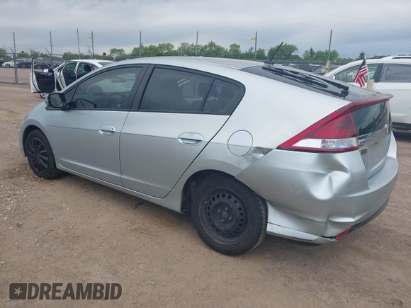 2012 Honda Insight LX with VIN JHMZE2H51CS002447, listed as a IAAI auction lot 42353583 with 179,377 mi miles and . Bid and sale history available at DreamBid. Image 3.