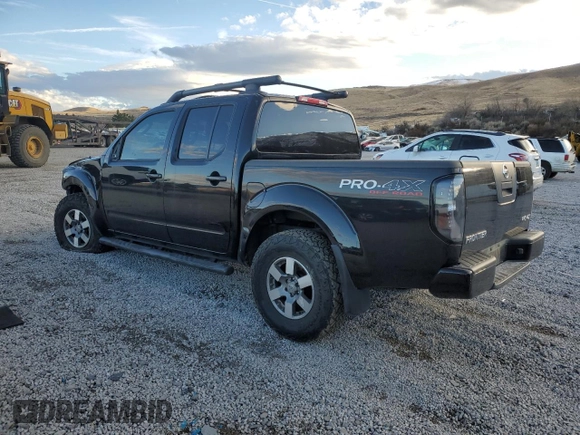 2011 Nissan Frontier Pro-4X with VIN 1N6AD0EV8BC427339, listed as a Copart auction lot 88293455 with 99,856 mi miles and Salvage title. Bid and sale history available at DreamBid. Image 2.