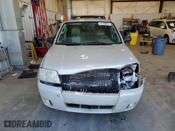 2007 Mercury Mariner Premier с VIN 4M2CU971X7KJ03424, выставлен на аукционе Copart как лот 51340895 с пробегом 185 576 миль миль и На запчасти • Non repairable. История ставок и продаж доступна на DreamBid. Изображение 5.