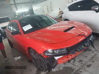 2021 Dodge Charger R/T with VIN 2C3CDXCT7MH612749, listed as a IAAI auction lot 42367060 with 58,411 mi miles and . Bid and sale history available at DreamBid. Image 1.