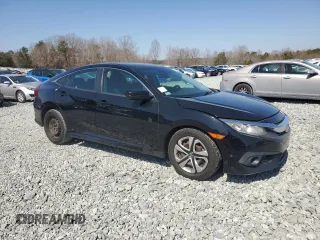 2017 Honda Civic Sedan LX with VIN 19XFC2F60HE010569, listed as a Copart auction lot 48873155 with 128,818 mi miles and Salvage Title. Bid and sale history available at carsss.com. Image 4.