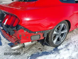 2015 Ford Mustang V6 z VIN 1FA6P8AM4F5314998, wystawiony jako IAAI lot #41292456 z przebiegiem 160 692 mil mil oraz . Historia ofert i sprzedaży dostępna na DreamBid. Obrazek 18.