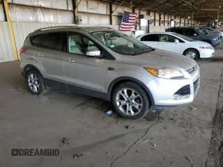 2016 Ford Escape Titanium with VIN 1FMCU9JX8GUA43002, listed as a Copart auction lot 52106635 with 96,340 mi miles and Clean Title. Bid and sale history available at carsss.com. Image 4.