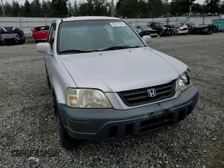 1999 Honda CR-V EX with VIN JHLRD1866XC074271, listed as a Copart auction lot 68741914 with 296,297 mi miles and Salvage Title. Bid and sale history available at carsss.com. Image 11.