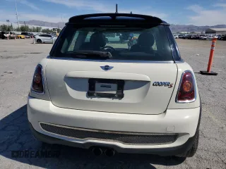 2009 MINI Hardtop S with VIN WMWMF73559TW83208, listed as a Copart auction lot 57347015 with 76,898 mi miles and Salvage title. Bid and sale history available at DreamBid. Image 6.