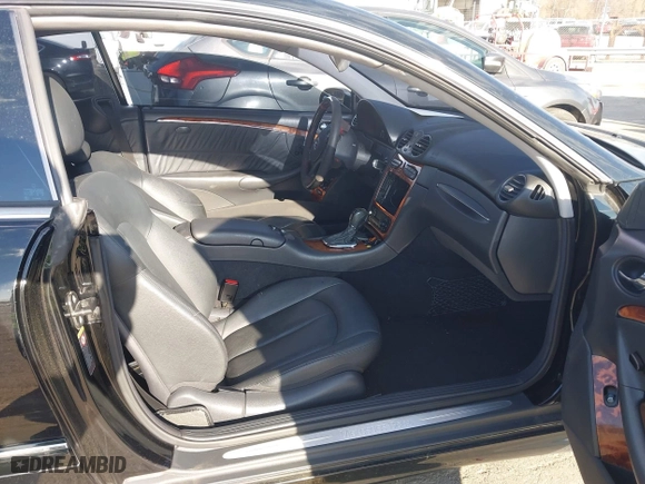 2004 Mercedes-Benz CLK-Class 5.0L with VIN WDBTJ75J14F095156, listed as a IAAI auction lot 41815605 with 176,902 mi miles. Bid and sale history available at carsss.com. Image 5.