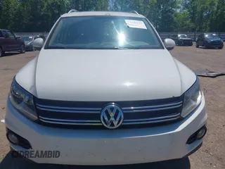 2013 Volkswagen Tiguan SE with VIN WVGAV7AX4DW528410, listed as a IAAI auction lot 42142132 with 148,511 mi miles and . Bid and sale history available at DreamBid. Image 6.