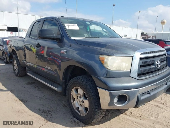 2010 Toyota Tundra 4WD Truck with VIN 5TFUW5F13AX138105, listed as a IAAI auction lot 41499018 with 295,414 mi miles. Bid and sale history available at carsss.com. Image 1.