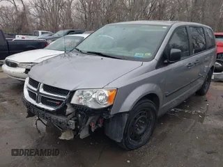 2014 Dodge Grand Caravan American Value with VIN 2C4RDGBG9ER187198, listed as a IAAI auction lot 41669334 with 204,803 mi miles and . Bid and sale history available at DreamBid. Image 19.