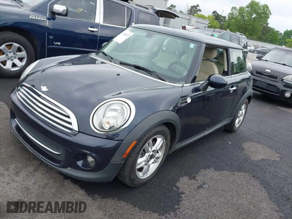 2013 MINI Hardtop with VIN WMWSU3C56DT547099, listed as a IAAI auction lot 42166823 with 138,700 mi miles and . Bid and sale history available at DreamBid. Image 2.