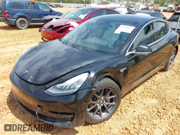 2018 Tesla Model 3 Long Range Battery with VIN 5YJ3E1EB1JF122786, listed as a IAAI auction lot 42010451 with 85,510 mi miles and . Bid and sale history available at DreamBid. Image 6.