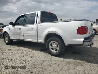 2002 Ford F-150 XLT with VIN 1FTRW07L52KA04929, listed as a Copart auction lot 54491815 with 169,132 mi miles and Salvage Title. Bid and sale history available at carsss.com. Image 2.