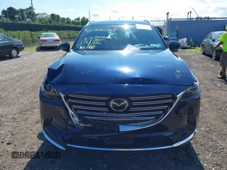 2019 Mazda CX-9 Grand Touring with VIN JM3TCBDY6K0335886, listed as a IAAI auction lot 42704250 with 37,171 mi miles and . Bid and sale history available at DreamBid. Image 11.