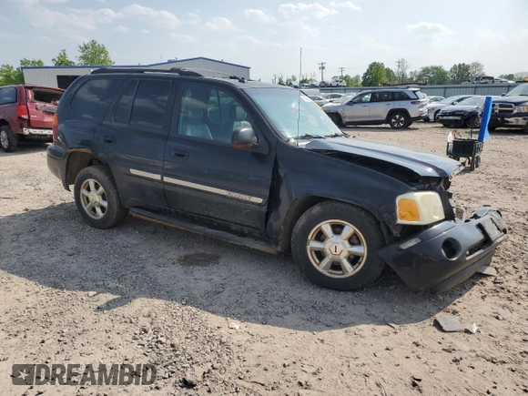 2004 GMC Envoy SLT with VIN 1GKDT13S342188670, listed as a Copart auction lot 59080825 with 334,233 mi miles and Salvage title. Bid and sale history available at DreamBid. Image 4.