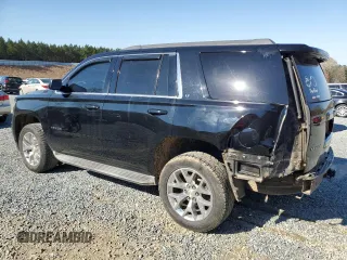 2015 Chevrolet Tahoe LT with VIN 1GNSCBKC0FR521749, listed as a Copart auction lot 50480075 with 156,940 mi miles and Salvage Title. Bid and sale history available at DreamBid. Image 2.