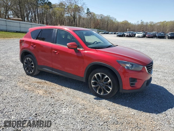 2016 Mazda CX-5 Grand Touring z VIN JM3KE2DYXG0840777, wystawiony jako Copart lot #49700585 z przebiegiem 116 469 mil mil oraz Szkoda całkowita • Salvage title. Historia ofert i sprzedaży dostępna na DreamBid. Obrazek 4.