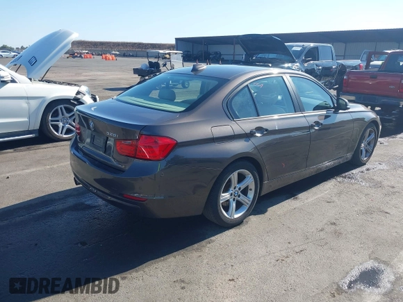 2014 BMW 3 Series 328i with VIN WBA3C1C57EK116483, listed as a IAAI auction lot 42697759 with 113,010 mi miles and . Bid and sale history available at DreamBid. Image 4.