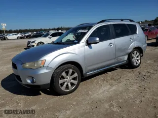 2010 Mitsubishi Outlander XLS with VIN JA4JT4AX9AZ007101, listed as a Copart auction lot 42451095 with 173,962 mi miles and Salvage Title. Bid and sale history available at carsss.com. Image 1.