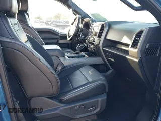 2020 Ford F-150 Raptor with VIN 1FTFW1RG6LFA91517, listed as a IAAI auction lot 41800990 with 112,535 mi miles and . Bid and sale history available at carsss.com. Image 5.