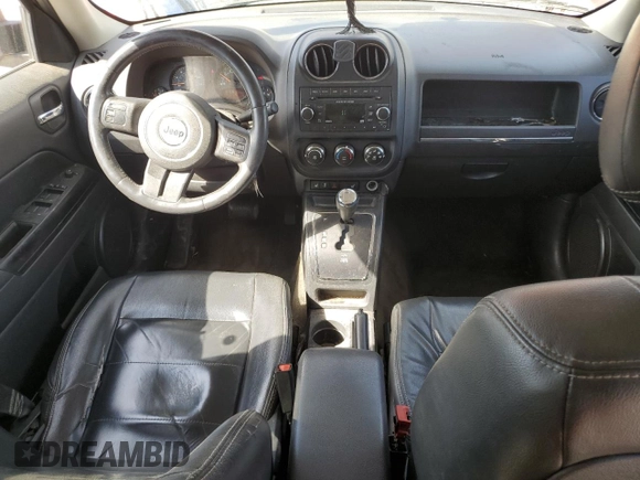 2014 Jeep Patriot Latitude with VIN 1C4NJPFA0ED856877, listed as a Copart auction lot 50406735 with 154,788 mi miles and Salvage Title. Bid and sale history available at carsss.com. Image 8.