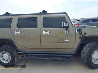 2006 Hummer H2 with VIN 5GRGN23U56H102574, listed as a IAAI auction lot 41955539 with 202,102 mi miles. Bid and sale history available at carsss.com. Image 14.