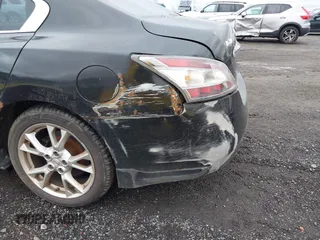 2014 Nissan Maxima SV with VIN 1N4AA5AP7EC490068, listed as a IAAI auction lot 42332173 with 126,323 mi miles and . Bid and sale history available at DreamBid. Image 6.