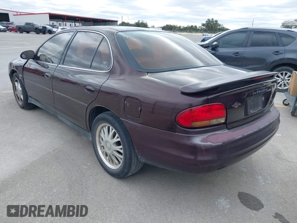 2002 Oldsmobile Intrigue GL z VIN 1G3WS52H52F283810, wystawiony jako IAAI lot #41585482 z przebiegiem 118 623 mil mil oraz . Historia ofert i sprzedaży dostępna na DreamBid. Obrazek 3.