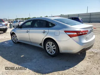 2013 Toyota Avalon XLE with VIN 4T1BK1EB4DU010057, listed as a Copart auction lot 50637065 with 64,265 mi miles and Salvage Title. Bid and sale history available at DreamBid. Image 2.