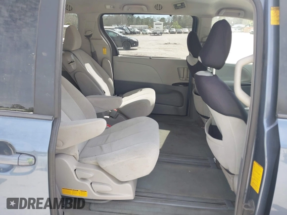 2014 Toyota Sienna LE AAS with VIN 5TDKK3DCXES498110, listed as a IAAI auction lot 41847116 with 242,065 mi miles and . Bid and sale history available at DreamBid. Image 8.
