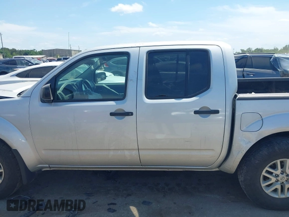 2019 Nissan Frontier SV with VIN 1N6AD0EV7KN701859, listed as a IAAI auction lot 42047454 with 182,922 mi miles and . Bid and sale history available at DreamBid. Image 14.