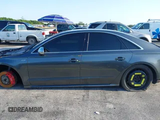 2015 Audi S8 z VIN WAUK2AFD5FN021986, wystawiony jako IAAI lot #41986491 z przebiegiem 142 073 mil mil oraz . Historia ofert i sprzedaży dostępna na DreamBid. Obrazek 14.