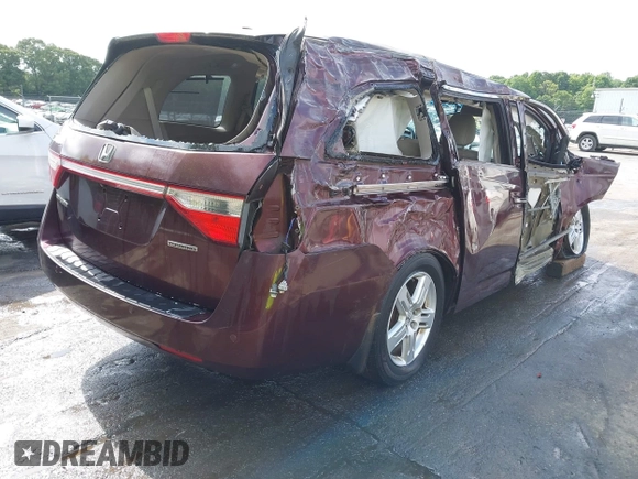 2012 Honda Odyssey Touring z VIN 5FNRL5H98CB035454, wystawiony jako IAAI lot #42285987 z przebiegiem Nie podano mil oraz . Historia ofert i sprzedaży dostępna na DreamBid. Obrazek 4.